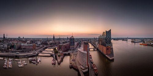 Hamburg harbour with Elbphilharmonie and sunset
