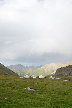 Yurts with rainbow by Mickéle Godderis
