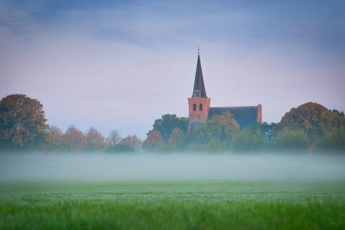Dutch landscape during a misty sunrise
