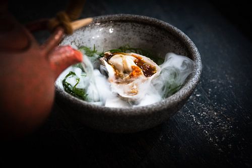 Oyster fine dining with red nitrogen teapot