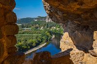 cliffs of lime rock above the river the dordogne in france from the area Domme with boats on the riv