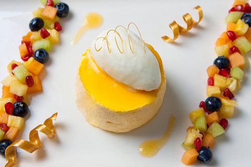 Fresh dessert of mango and fruit by Henny Brouwers