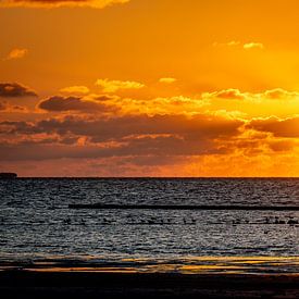 Sonnenuntergang am Strand von Foto Oger