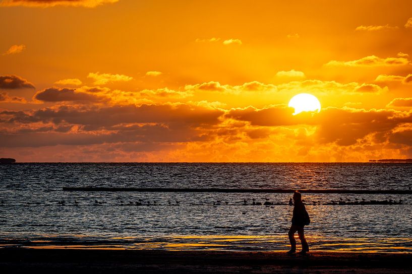 Sunset on the beach by Foto Oger