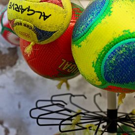 Balls at kiosk in the Algarve. by Marieke van der Hoek-Vijfvinkel
