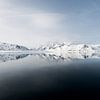 The ultimate reflection of a glacier on Spitsbergen by Gerry van Roosmalen