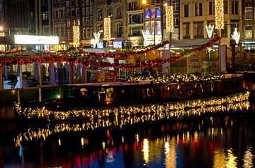 Canal boats during Christmas season by Remco Swiers