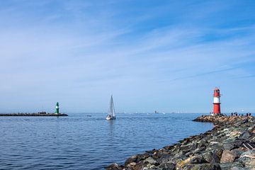 pier with sailing boat at the coast of the Baltic Sea in Warnemünde by Rico Ködder