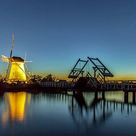Illuminated windmills Kinderdijk - 3 by Loek Groot