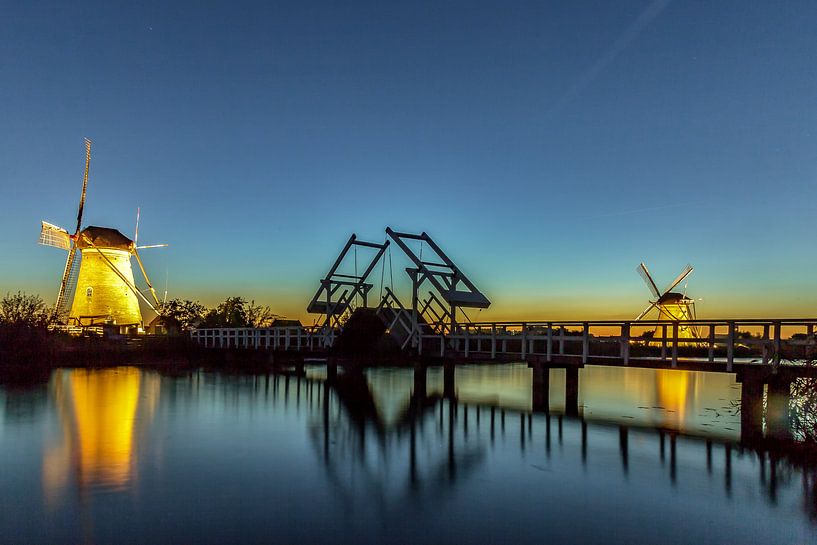 Illuminated windmills Kinderdijk - 3 by Loek Groot