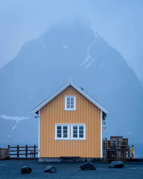 The yellow house on Lofoten Sakrisoy by Margreet Riedstra