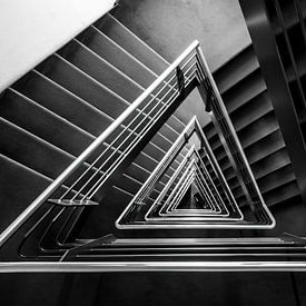 Triangular staircase in hotel used as a fire and emergency staircase. by John Duurkoop