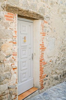 Pastel blue door in a village in the South of France