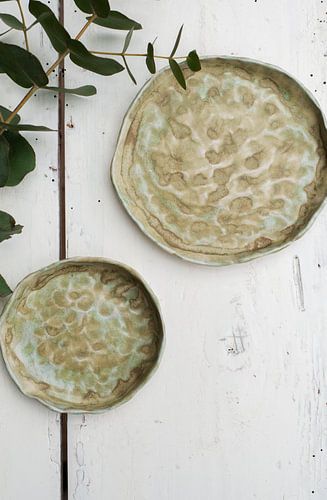 Green pottery with eucalyptus