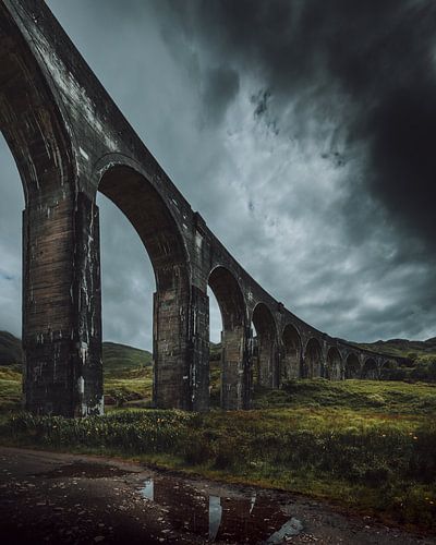 Beneath the looming Scottish arches