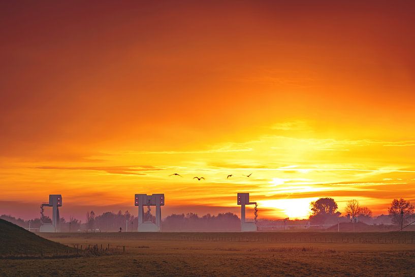 Driel dam and lock complex at sunset by Nicky Kapel