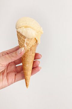 Scoop of lavender ice cream on a cone by Nina van der Kleij