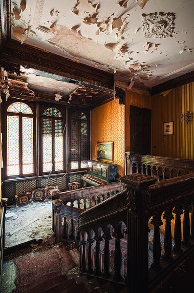 Abandoned Piano next to Stairs. by Roman Robroek - Photos of Abandoned Buildings