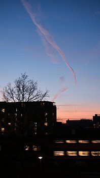 Avondlucht boven de stad