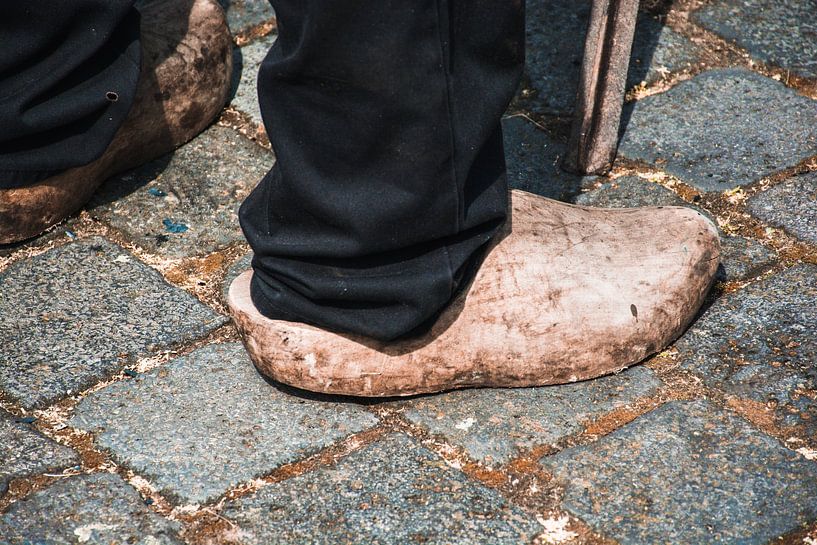 Dutch wooden clogs clink on the street by Zaankanteropavontuur