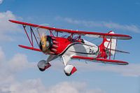Classic red and white Double Decker Airplane in a bird's eye view