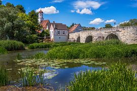 Historic bridge over the river Wörnitz in Harburg by ManfredFotos