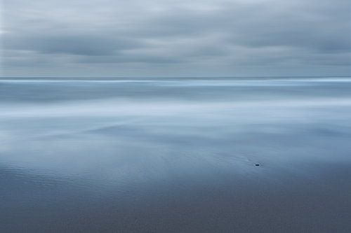 In Zeit und Raum am Strand