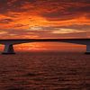 Sea bridge at sunrise by Jan Jongejan