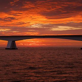 Sea bridge at sunrise by Jan Jongejan