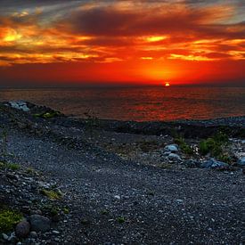 Rotskust in de zonsondergang van georgfotoart