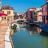 Colorful buildings on the island of Burano near Venice, Italy by Rico Ködder
