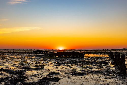 Wadden Sea, sunrise at Paesens Moddergat (Shipwreck of Wierum)