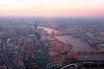 Aerial view of London and the River Thames with urban architecture at sunset in England by Eye on You