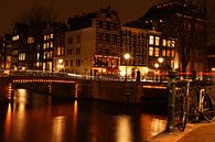 Amsterdam bij nacht en overal fietsen van Marjo Snellenburg thumbnail