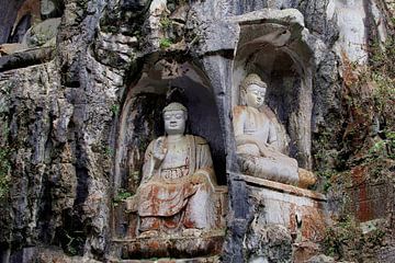 Boeddha's in rotswand