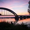 Spoorbrug Culemborg bij zonsondergang van Milou Oomens