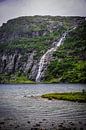 Waterfall at Hunnevatn: Dramatic Beauty on Rainy Day by Be More Outdoor thumbnail
