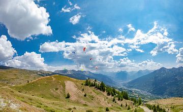 Paragliders take off over Le Puy de La Salle, La sSalle les Alpes, Hautes Alpes, France by Rene van der Meer