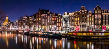 Houseboats in the Amsterdam canals by Ramon Lucas