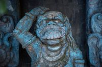 Indonesian blue statue in a sculpture garden