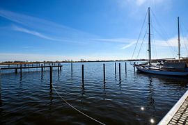 Sailing ships in the harbour of Puddemin on the island of Rügen by GH Foto & Artdesign