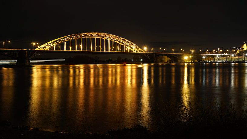 Bridge over the Waal at night Nijmegen by Gerard van der Vries