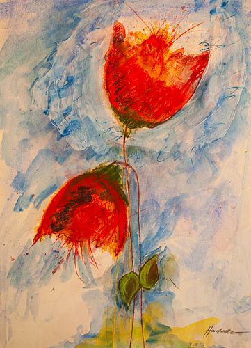 Two red poppies in the blue sky