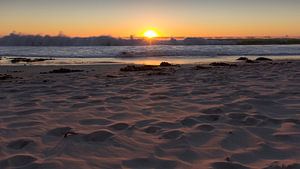 Ondergaande zon aan het strand, Camps Bay Kaapstap
