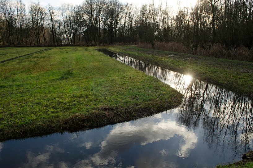 zon in de wolken van Paul de Vos