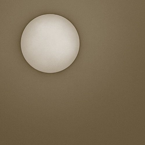 Sun against a brown background