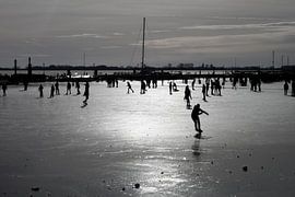 Schaatsers op het meer van DafnePhoto