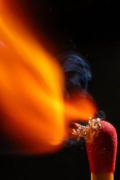 Igniting match in backlight by Humphry Jacobs