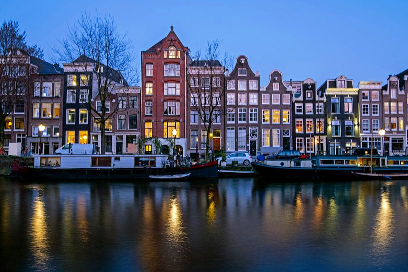 Paysage de la ville d'Amsterdam au coucher du soleil par Eye on You