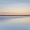 Peaceful sunset on a quiet beach by Claire van Dun